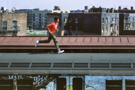 Martha Cooper: Skeme running on top of subway, Bronx, NYC